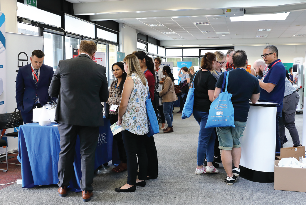 People talking at a conference event